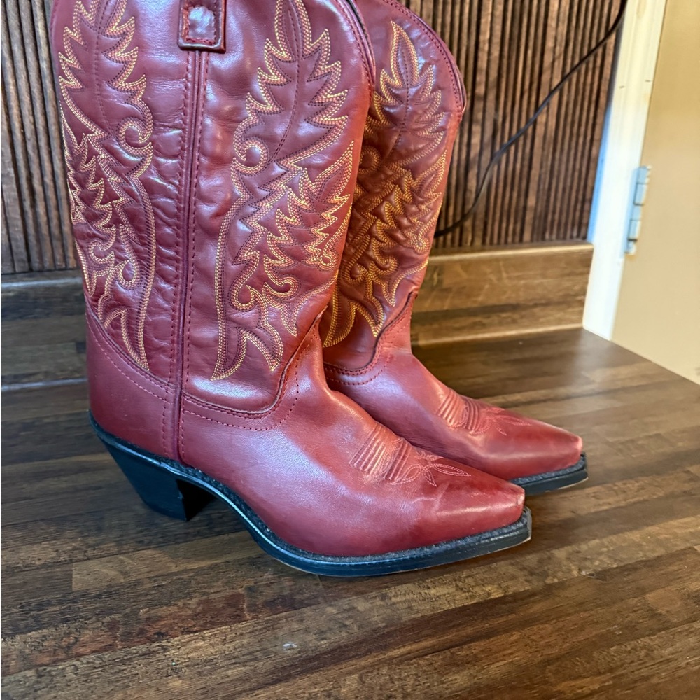Red Heeled Boots with Intricate Western Stitching and Pointed Toe
